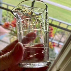 EASTMAN KODAK, VINTAGE GLASS MEASURING BEAKER.  2 3/4”W X 4”H X 2”BASE